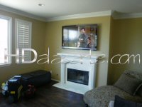 TV mounted above fireplace in Porter Ranch, CA